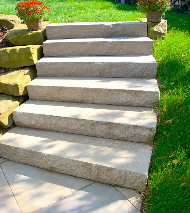 Full-sized natural stone step pieces with natural cleft treads and stone landing